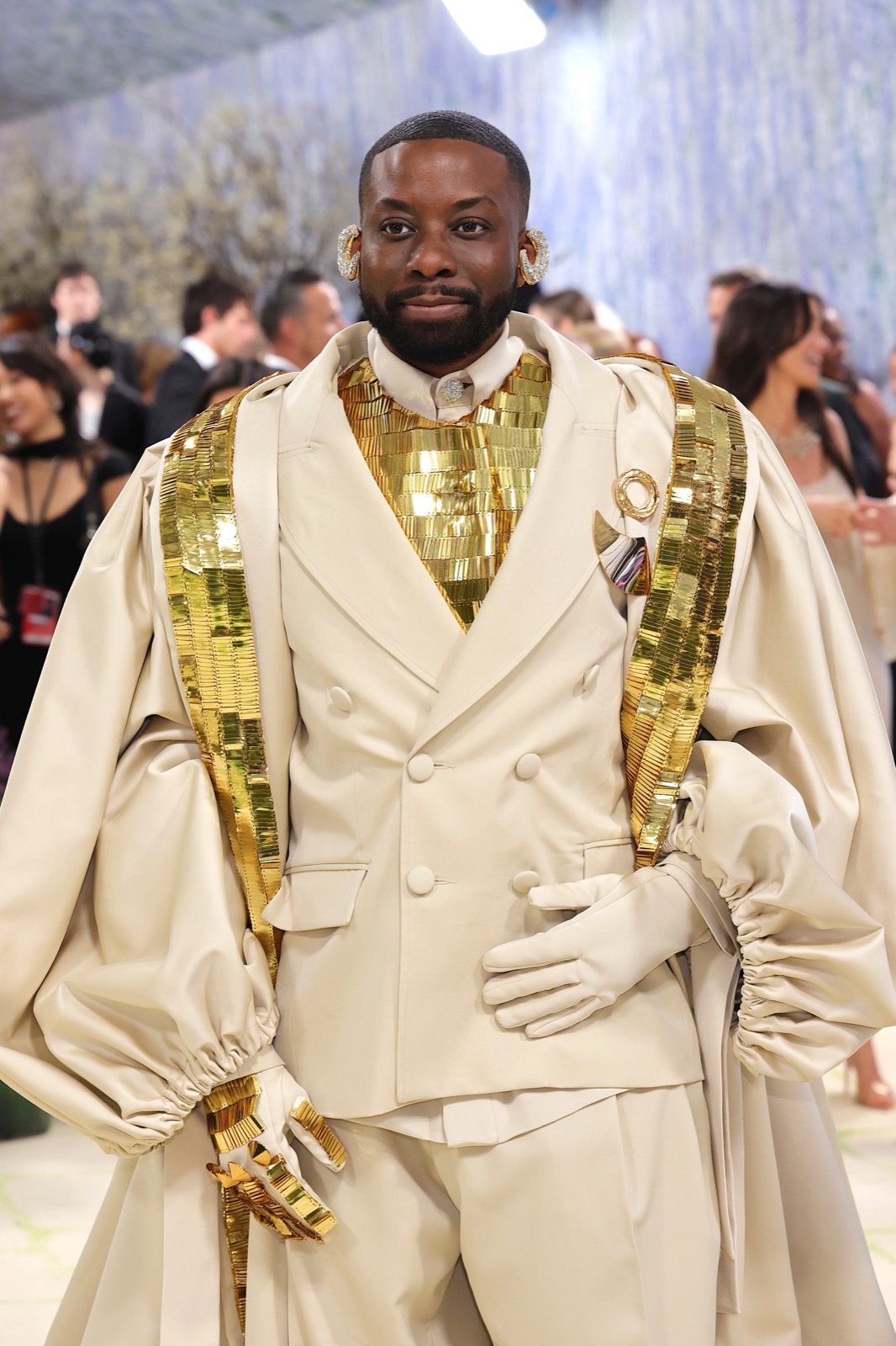 John Imah at the Met Gala in a cream and gold custom look